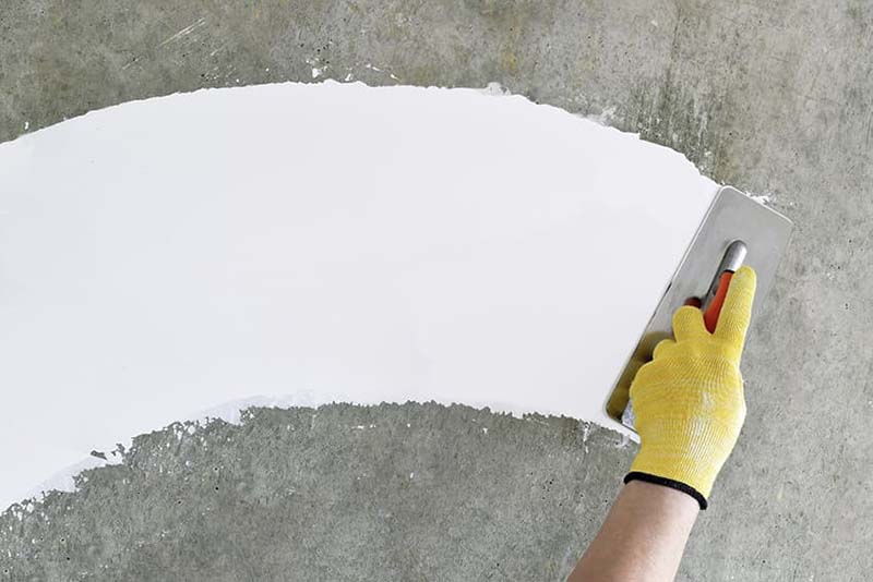 Lớp bột bả giúp làm phẳng và hoàn thiện bề mặt trước khi sơn